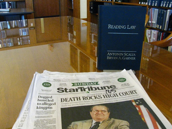 Newspaper headline and book